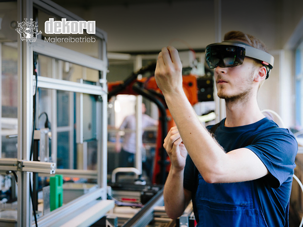 Craftsman wearing AR glasses working on a machine.