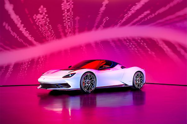 The Battista super sports car by Pininfarina against a magenta background